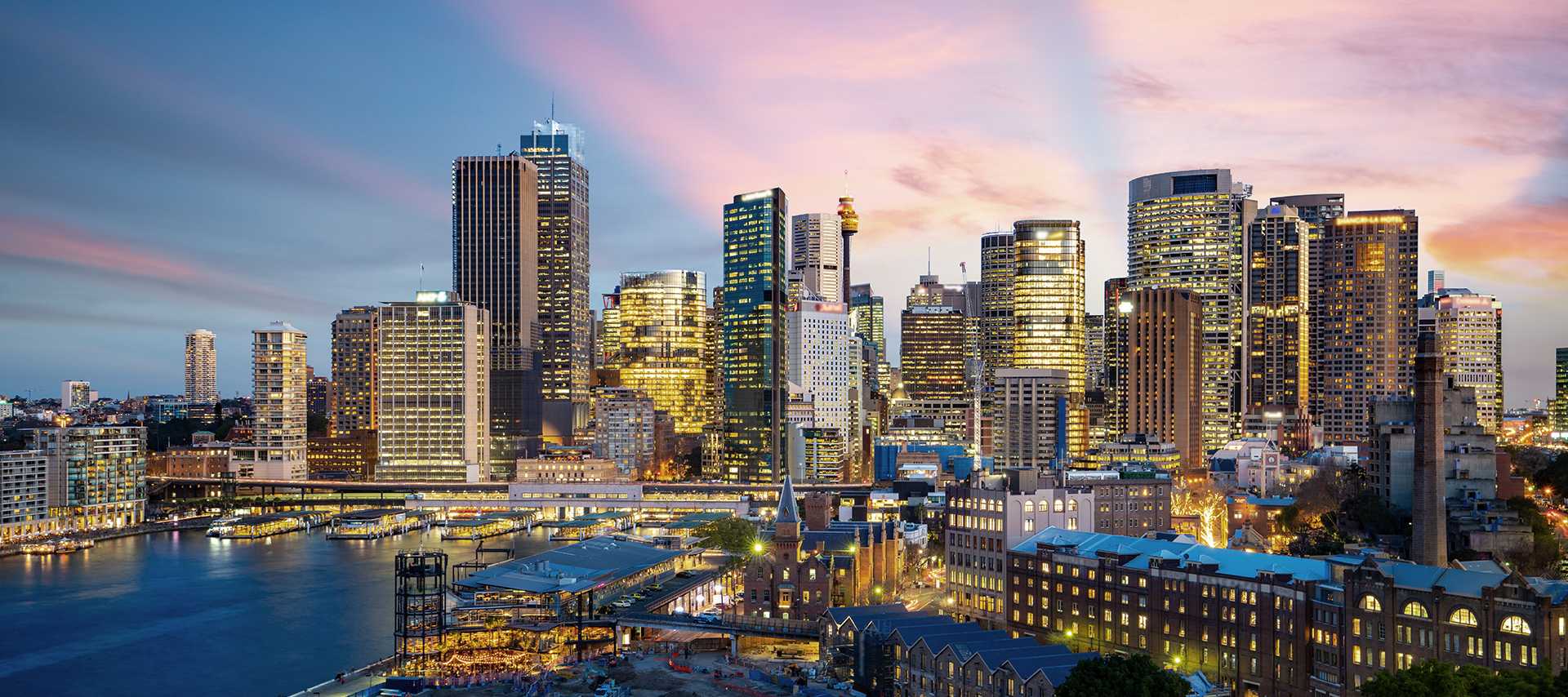 Sydney city skyline and Circular Quay at dusk